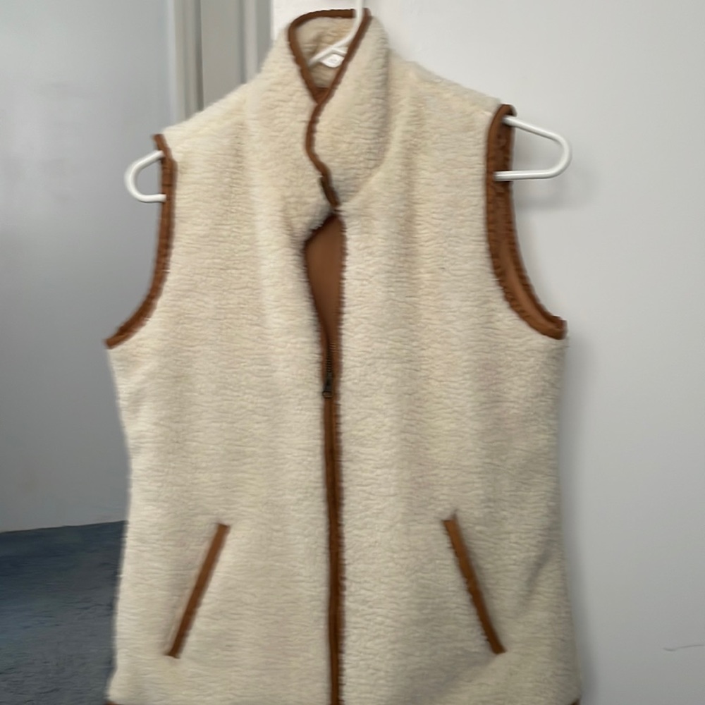 White Sherpa vest with tan trim
